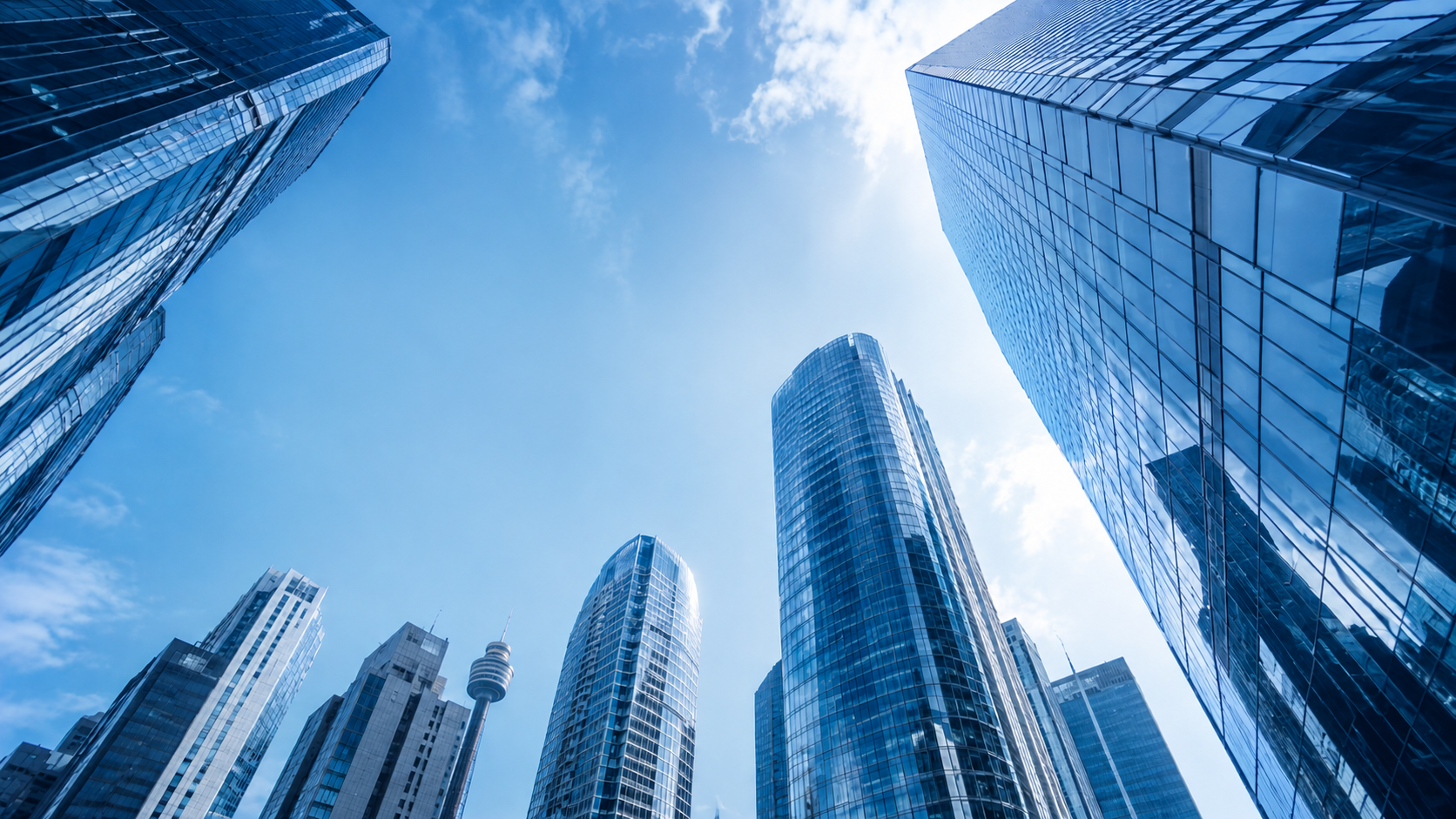 Modern commercial buildings representing business protection